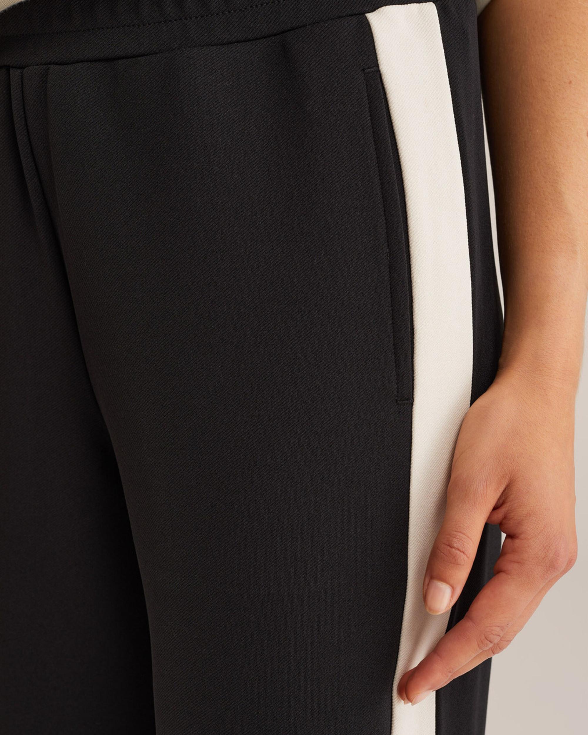 WE Fashion Bikses melns / balts