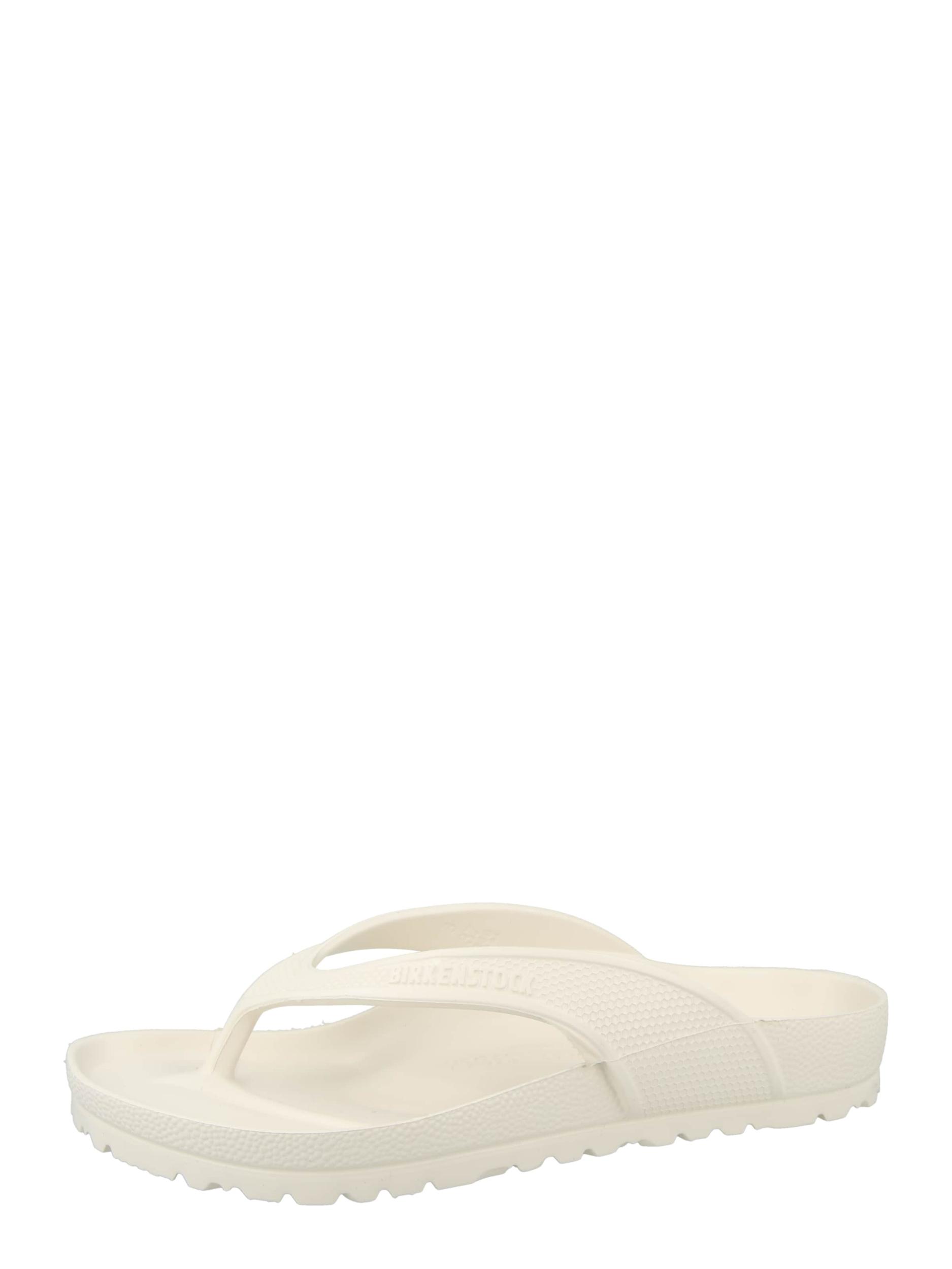 BIRKENSTOCK Iešļūcenes ar pirkstu atdalītāju 'Honolulu' balts